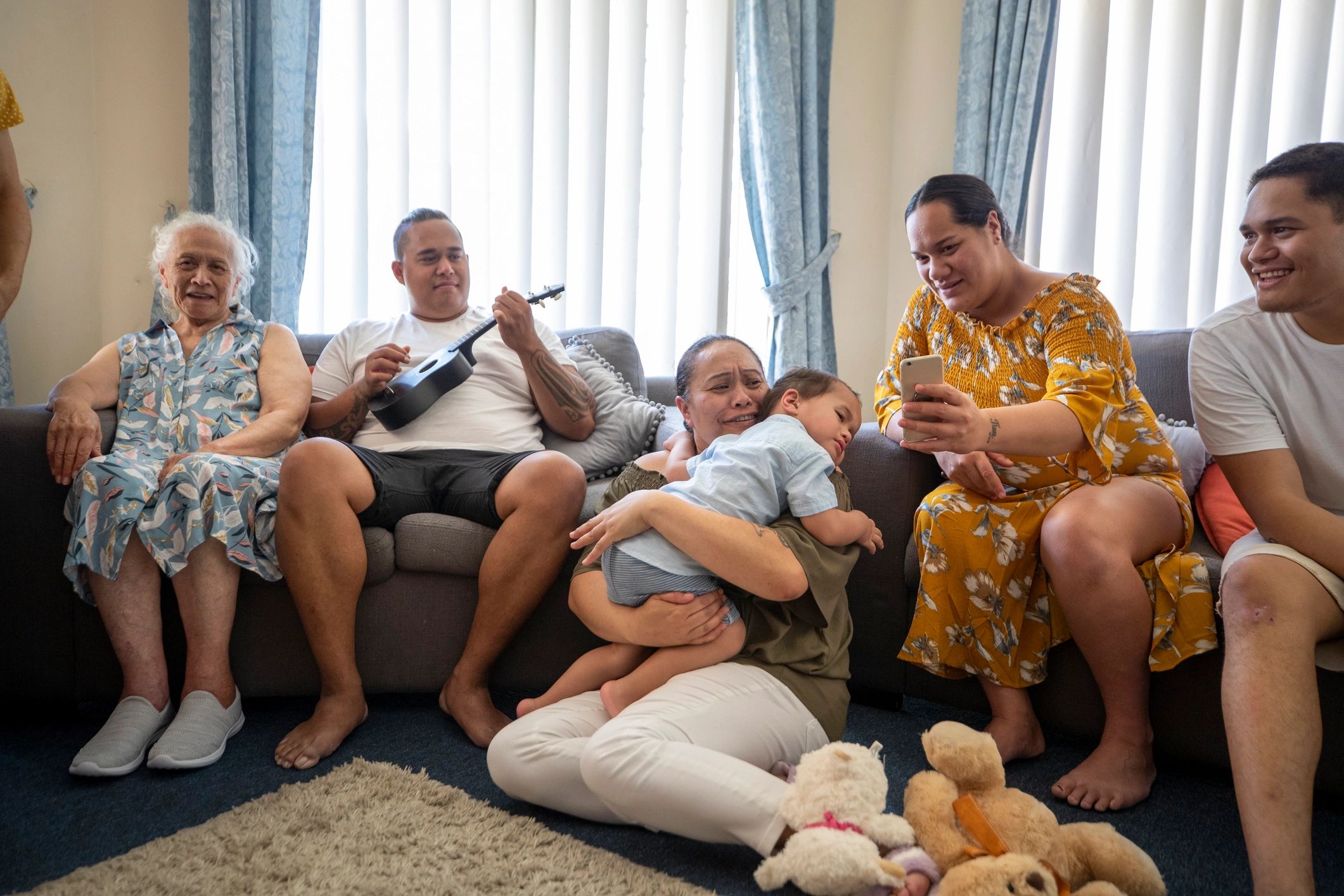 Multigenerational family gathered together at home