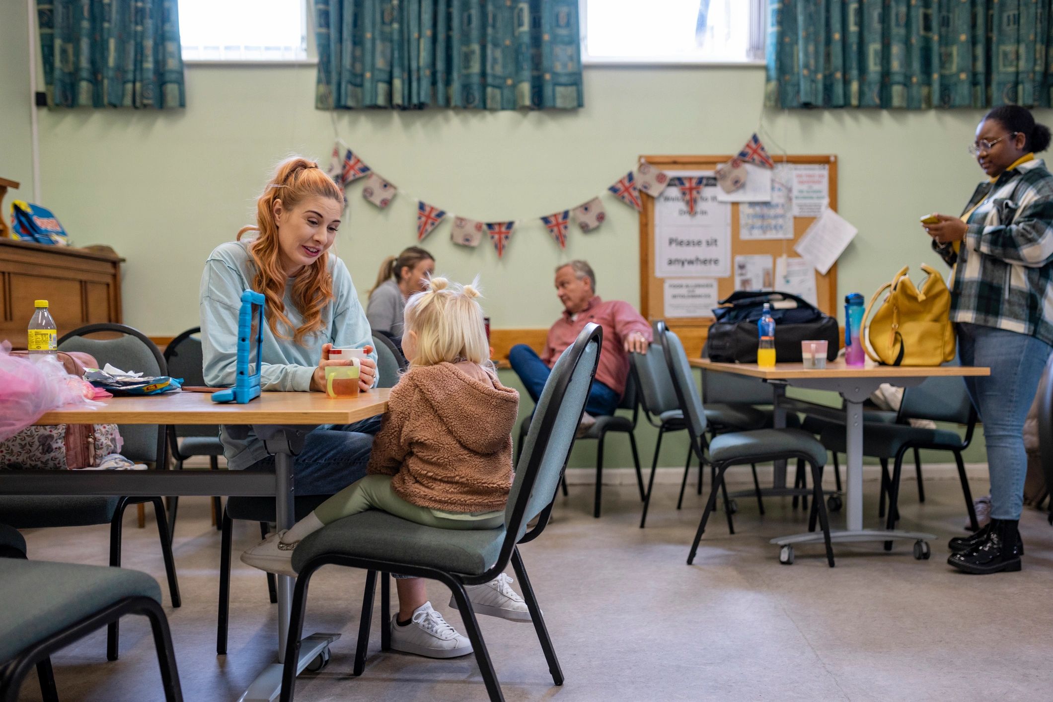 Mother and daughter spending time together in a community space