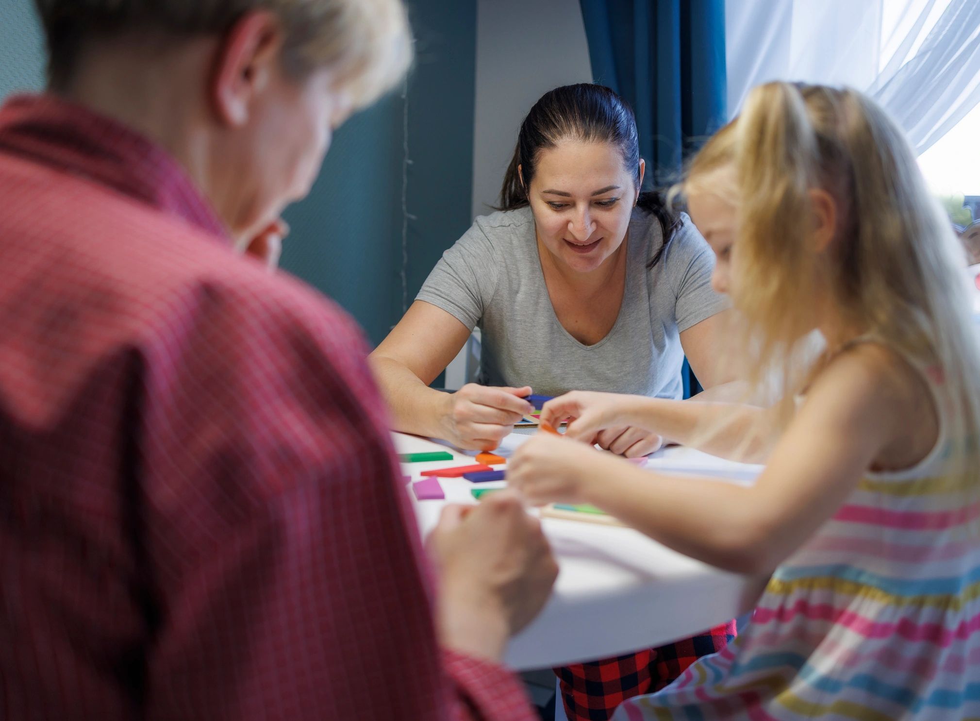 Family learning together at a table