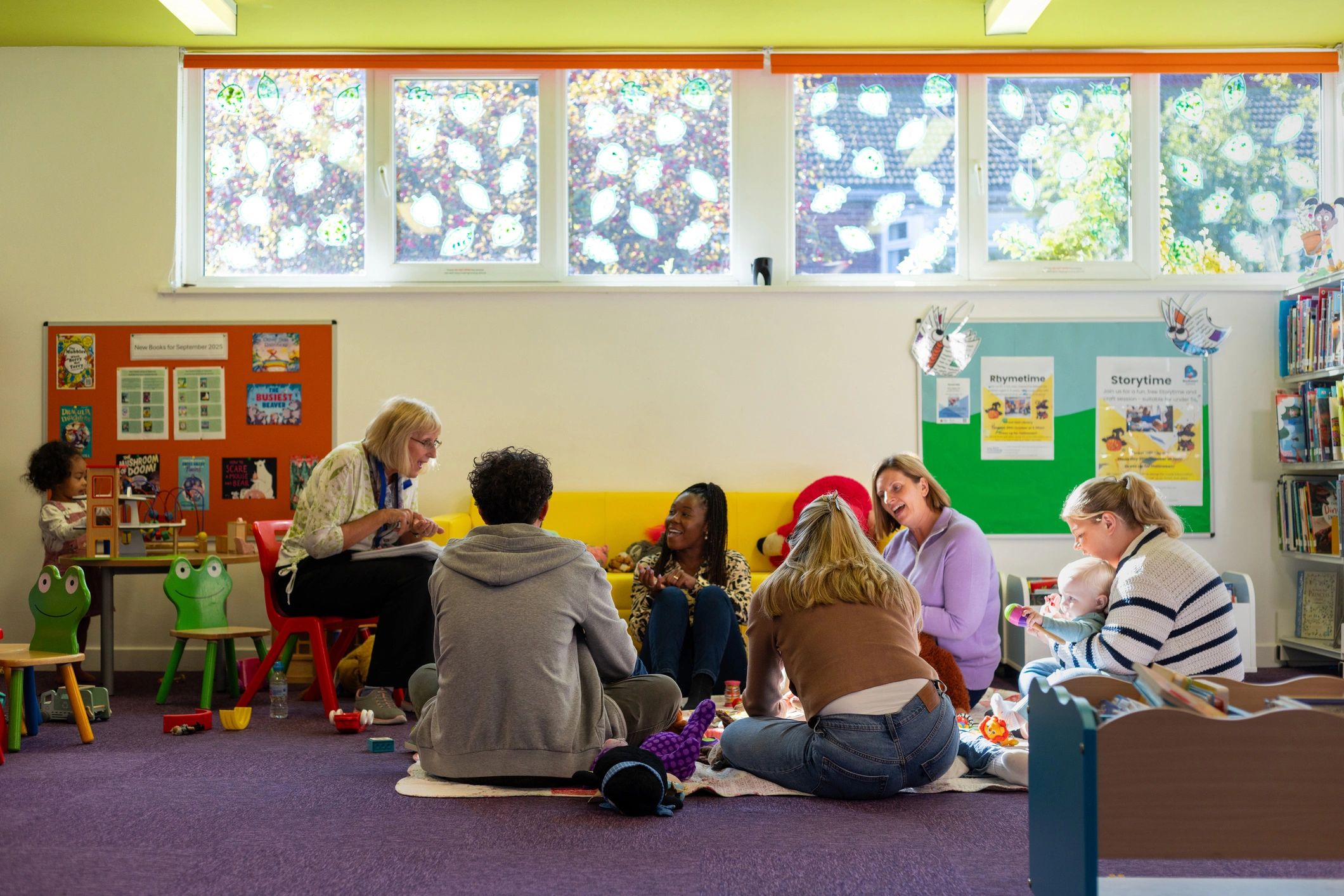 Children and adults participating in an educational community activity