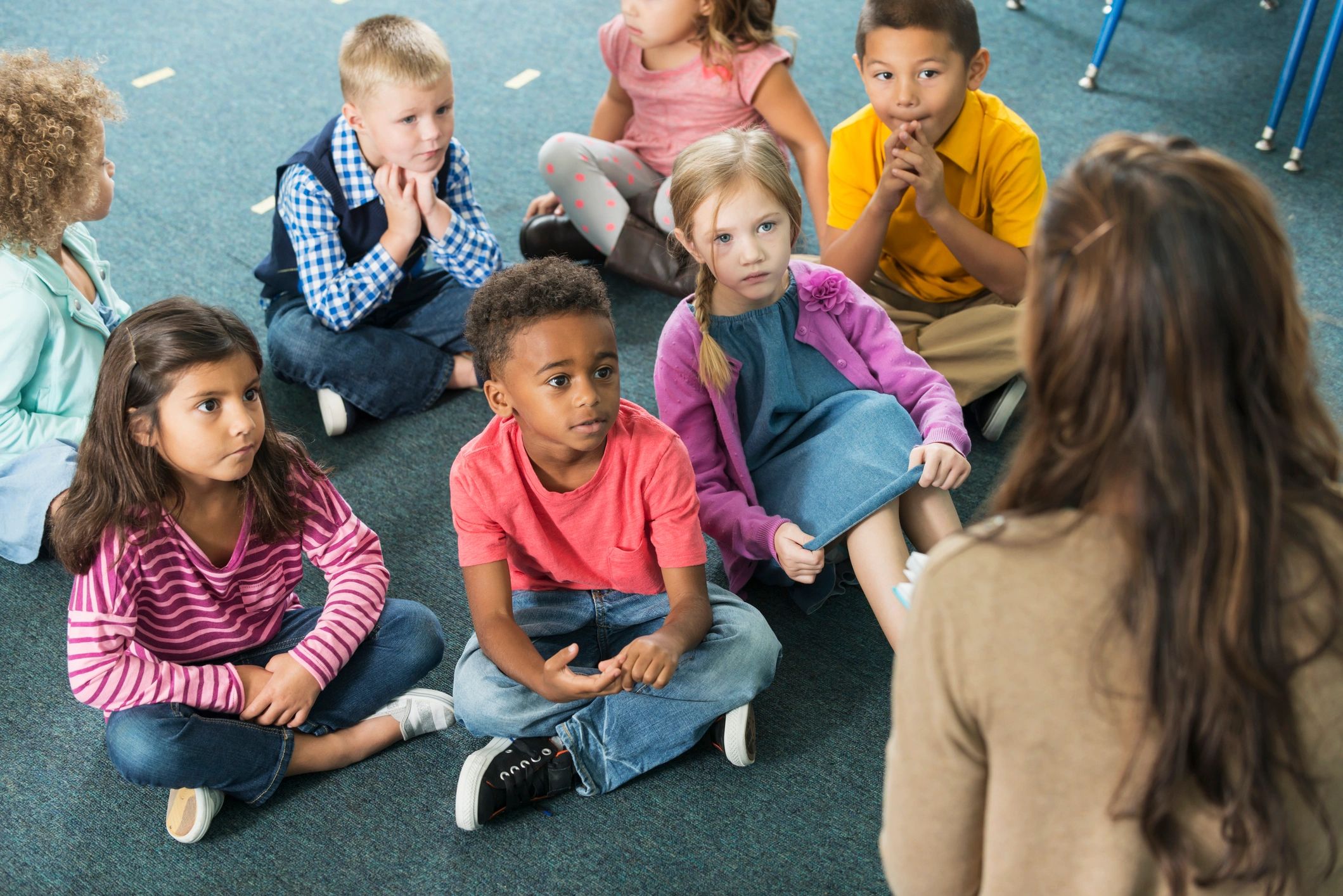 Children learning together with a teacher